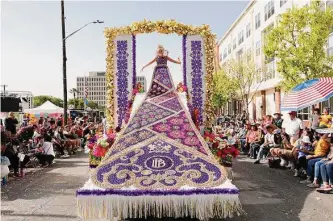  ?? Jerry Lara/staff file photo ?? The Battle of Flowers parade, shown in this 2022 photo, traces its roots to 1891, when it was supposed to be viewed by President Benjamin Harrison. It was postponed because of rain.