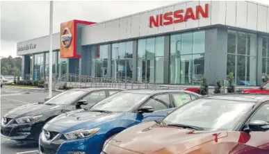  ?? STAFF PHOTOS BY MIKE PARE ?? Mountain View Nissan of Dalton’s new store is 55,000 square feet and the showroom can hold seven vehicles, officials say.