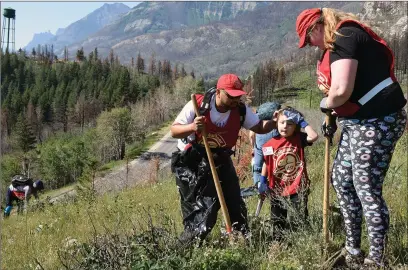  ?? Photo courtesy Parks Canada ?? Volunteers of all ages came out to help Waterton Lakes National Park officials with the 25th Annual Knapweed Rodeo July 21. See related photo July 21.