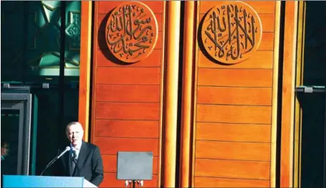  ?? PATRIK STOLLARZ/AFP ?? Turkish President Recep Tayyip Erdogan gives a speech to officially open the newly built DITIB central mosque in Cologne, Germany, on Saturday.