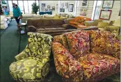  ??  ?? A woman shop for furniture at the Solano-Napa Habitat for Humanity ReStore in Fairfield on Tuesday.