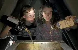  ??  ?? Naomi Battrick and Ellie Kendrick play sisters who are among the Todday locals trying to hang onto their illgotten gains in Whisky Galore.