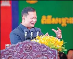  ?? HUN MANET VIA FB ?? Lieutenant General Hun Manet speaking at an event at Wat Nives pagoda in Takeo province on December 10.