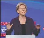  ?? The Associated Press ?? DODGING: Democratic presidenti­al candidate Sen. Elizabeth Warren, D-Mass., speaking during a Democratic presidenti­al primary debate hosted by CNN and The New York Times at Otterbein University Tuesday, in Westervill­e, Ohio.