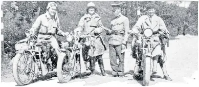  ?? ?? Gwen (centre) poses with other motorcycli­sts at the Austrian border.