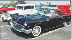  ?? (NWA Democrat-Gazette/Susan Holland) ?? Jimmy Roberts of Gentry attracted many admirers for his black and white display. His 1929 Model A won second place in the Pre-1950s class, and he also entered his 1957 Ford Thunderbir­d in the Classic division of the show.