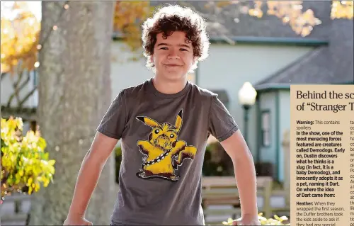  ?? SEAN D. ELLIOT/THE DAY ?? Gaten Matarazzo, who plays Dustin Henderson on the Netflix hit series “Stranger Things,” poses for photos in the gazebo at Olde Mistick Village Sunday, November 26, 2017.