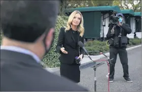  ?? JACQUELYN MARTIN) — THE ASSOCIATED PRESS ?? White House press secretary Kayleigh McEnany, talks to the media, Sunday, Oct. 4, outside the White House in Washington.