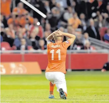  ?? Foto: John Thys, afp ?? Nicht zu fassen: Arjen Robben bei der 0:1-Niederlage gegen Island.