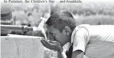  ??  ?? A student from Medhananda Kanishta Vidyalaya drinking water post commission­ing of the water treatment plant