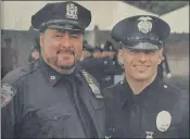  ?? PHOTO COURTESY OF MARC MANFRO ?? Like father, like son: Marc Manfro wears his New York police uniform alongside his son, Steven, who works for the Los Angeles Police Department. Both men were standout athletes who suffered injuries, then went into police work.