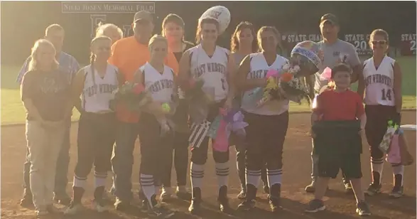  ?? (Photo by Robbie Faulk, SDN) ?? The East Webster softball seniors were recognized prior to Tuesday's game.