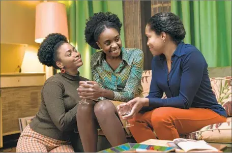  ?? Tatum Mangus Annapurna Pictures ?? TEYONAH PARRIS, left, Kiki Layne and Regina King play a family sticking together through crises in “If Beale Street Could Talk.”