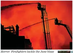  ??  ?? Horror: Firefighte­rs tackle the June blaze