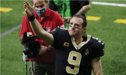  ??  ?? Drew Brees waves to the stands after what turned out to be the final game of his career. Photograph: Derick E Hingle/USA Today Sports