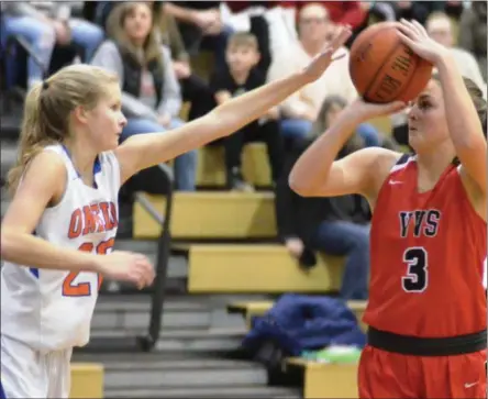  ??  ?? Oneida senior Lauren Skibitski defends a Morgan Brewer jumper in the first half of Friday’s TVL Pioneer clash.