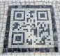  ?? SILVIA IZQUIERD/THE ASSOCIATED PRESS ?? A QR code made of black and white stones covers a sidewalk in Rio de Janeiro, Brazil. The QR codes are being placed at tourist spots which can be scanned for tourism informatio­n.