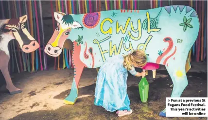  ??  ?? > Fun at a previous St Fagans Food Festival. This year’s activities will be online