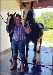  ?? SUBMITTED PHOTO - GREY MUZZLE MANOR ?? Grey Muzzle Manor founder Marcy Tocker with two horses rescued from the auction recently. The sanctuary recently moved to a 45-acre Mohrsville location.