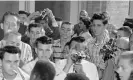  ?? Photograph: William P Straeter/AP ?? A close up of the North Little Rock High School photo. Jerry Jones is in a horizontal striped shirt, to the right of the raised camera.