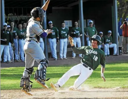  ?? PHOTOS BY STAN HUDY — SHUDY@DIGITALFIR­STMEDIA.COM ?? Shenendeho­wa’s Kurt Forsell slides into home under the high throw to the plate in the fifth inning to tie the game at two runs each.