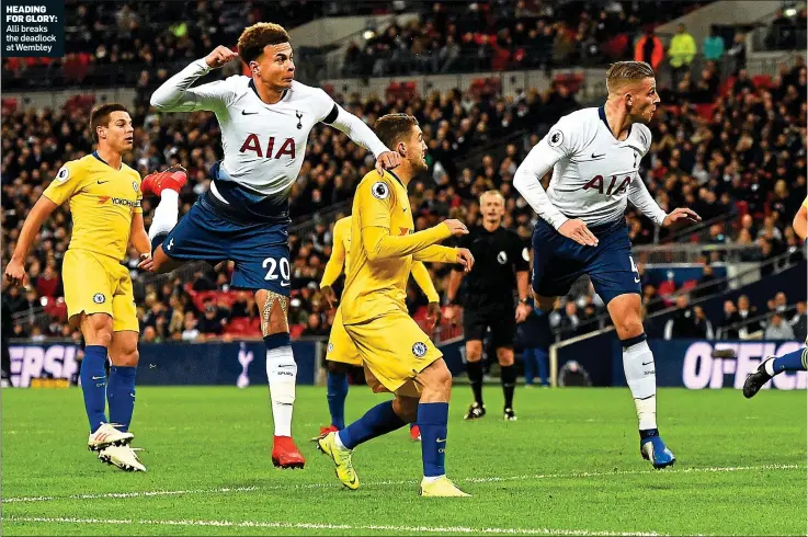  ??  ?? HEADING FOR GLORY: Alli breaks the deadlock at Wembley