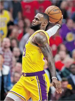  ?? CRAIG MITCHELLDY­ER / THE ASSOCIATED PRESS ?? Superstar LeBron James scored 26 points in his Los Angeles Lakers debut, but it was not enough in a 128-119 loss to Portland on Thursday night.