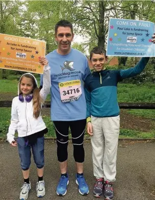  ??  ?? Paul and Joanne Lake power walked the 10km to raise money for Jump Space. Paul is pictured with his children Edward, 11, and Hannah, eight