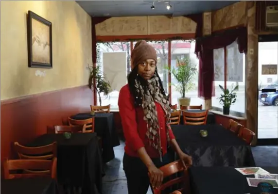  ??  ?? Joyce Swaby, owner of It’s A food Thing on King William, serves Caribbean-inspired fare. Read more on HB14.
