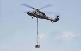  ?? Ned Gerard/Hearst Connecticu­t Media ?? Officials with the Stratford-based helicopter manufactur­er say they are ready to work with federal investigat­ors to determine what caused the Black Hawk helicopter to crash.