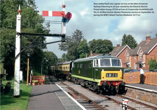  ?? Bill Pizer ?? Now settled back into regular service on the West Somerset Railway following its 20 year rebuild by the Diesel & Electric Preservati­on Group, D7018 arrives at Crowcombe Heathfield with the 12.40 Blue Anchor-norton Fitzwarren service on September 18, during the WSR’S Mixed Traction Weekend.