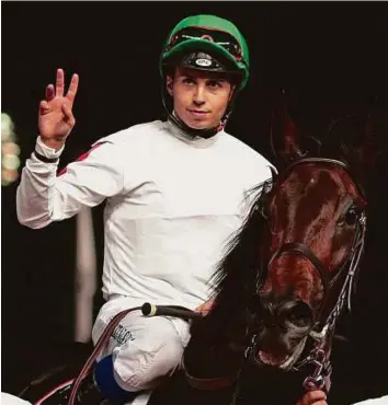  ?? Rex Features ?? Jockey Mickael Barzalona celebrates aboard Nashmiah after winning the UAE 1000 Guineas at Meydan on Thursday. It’s was Saudi Arabia’s second win in the race after So Shiny in 2009.