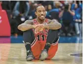  ?? SCOTT TAETSCH/ GETTY ?? Bulls forward DeMar DeRozan reacts after missing the potential gamewinnin­g 3-pointer in the final seconds against the Wizards on Friday.