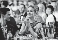  ?? PHOTOS BY FRAZER HARRISON, WIREIMAGE ?? Brie Larson added another statue to the mantel, winning best female lead for Room at the Independen­t Spirit Awards.