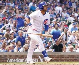  ?? NUCCIO DINUZZO/GETTY IMAGES ?? Cubs first baseman Alfonso Rivas follows the flight of his three-run home run in the second inning Saturday off Pirates starter Zach Thompson.
