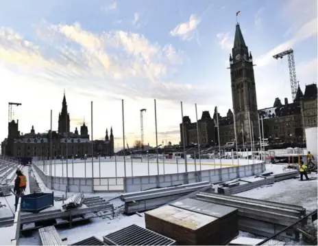  ?? JUSTIN TANG/THE CANADIAN PRESS ?? Rules of the “Canada 150 Rink” being built on Parliament Hill include no hockey sticks or pucks, no cellphone use, no food and no “multiplaye­r games.”