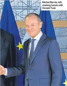  ??  ?? Michel Barnie, left, shaking hands with Donald Tusk