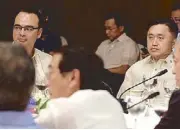  ??  ?? Sen. Alan Cayetano and Special Assistant to the President Bong Go join the dinner.