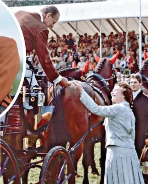  ??  ?? Honour: Philip receives a trophy from the Queen at Windsor in 1982