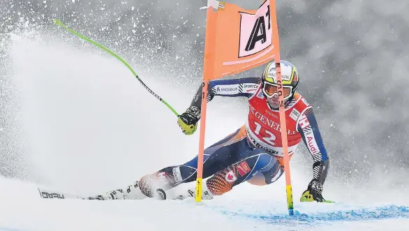  ?? JOE KLAMAR/AFP/GETTY IMAGES ?? Manuel Osborne-Paradis and the Canadian alpine ski team benefit from both amateur sport funding and the contributi­ons of a major sponsor.
