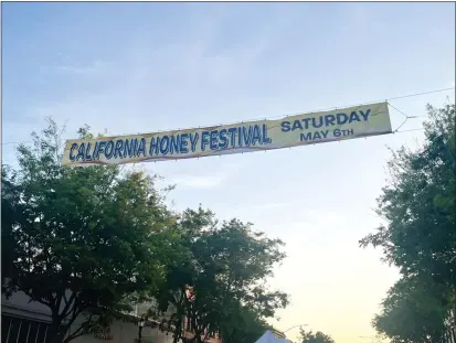  ?? CARLOS GUERRERO — DAILY DEMOCRAT ?? The banner promoting the California Honey Festival in downtown Woodland. The festival dedicated to promoting the importance of bees and pollinatio­n will return for its fifth year on Saturday, May 6.