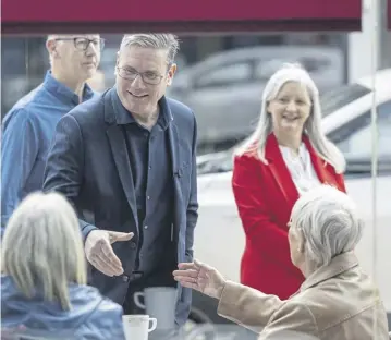  ?? PICTURE: ROBERT PERRY/GETTY IMAGES ?? UK Labour leader Sir Keir Starmer with local candidate Wilma Brown during a visit to Kirkcaldy