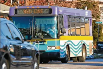  ?? FILE ?? A Red Line bus in the Middletown Transit Service fleet travels on Central Avenue. The Butler County RTA manages the MTS fleet. The Butler County RTA was awarded $5 million from the Ohio-Kentucky-Indiana Regional Councils of Government­s for its bus replacemen­t project.