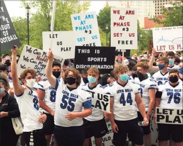  ?? Christian Abraham / Hearst Connecticu­t Media ?? High school football coaches, players and their families from across the state went to the Hartford state Capitol building in September to protest not being able to play due to the coronaviru­s.