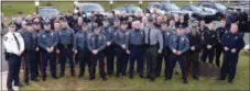  ?? TOM KELLY III — FOR DIGITAL FIRST MEDIA ?? Lower Pottsgrove Township Police Sgt. Robert R. Greenwood (center with his son, Ross a PSP Trooper) stand with officers there to wish him luck on his retirement. Greenwood served as a police officer for 34 years.