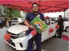  ??  ?? AMIR Qhaleef memenangi Perodua Axia di Restoran Mohd Chan.