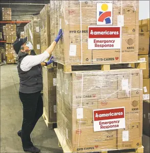  ?? Contribute­d photo ?? Americares is delivering protective masks for health workers on the front lines of the COVID- 19 pandemic in the United States.