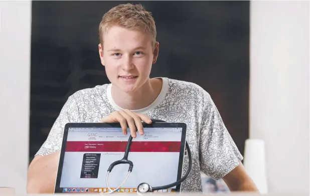  ?? Picture: ANNA ROGERS ?? FINGERS CROSSED: William Tucker, who received an OP2 at Cairns High School last year, is hoping to do medicine at James Cook University in Townsville.