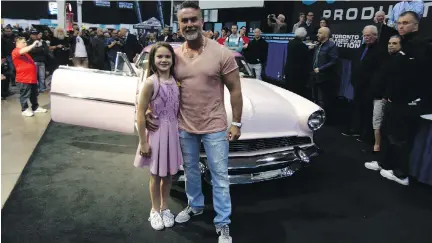  ?? ALYN EDWARDS ?? Alys Mia Benloulou is joined by father Olivier as she sells her 1955 Lincoln for $57,000, all donated to the Canadian Cancer Society.