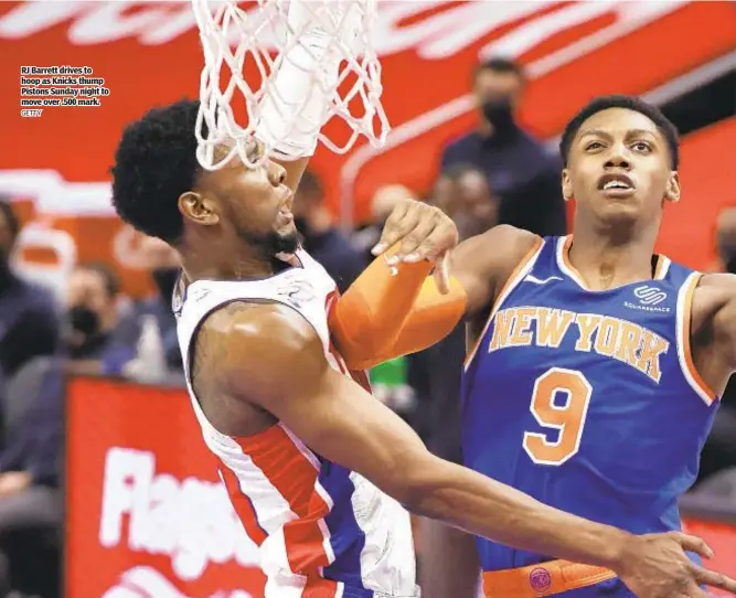  ?? GETTY ?? RJ Barrett drives to hoop as Knicks thump Pistons Sunday night to move over .500 mark.